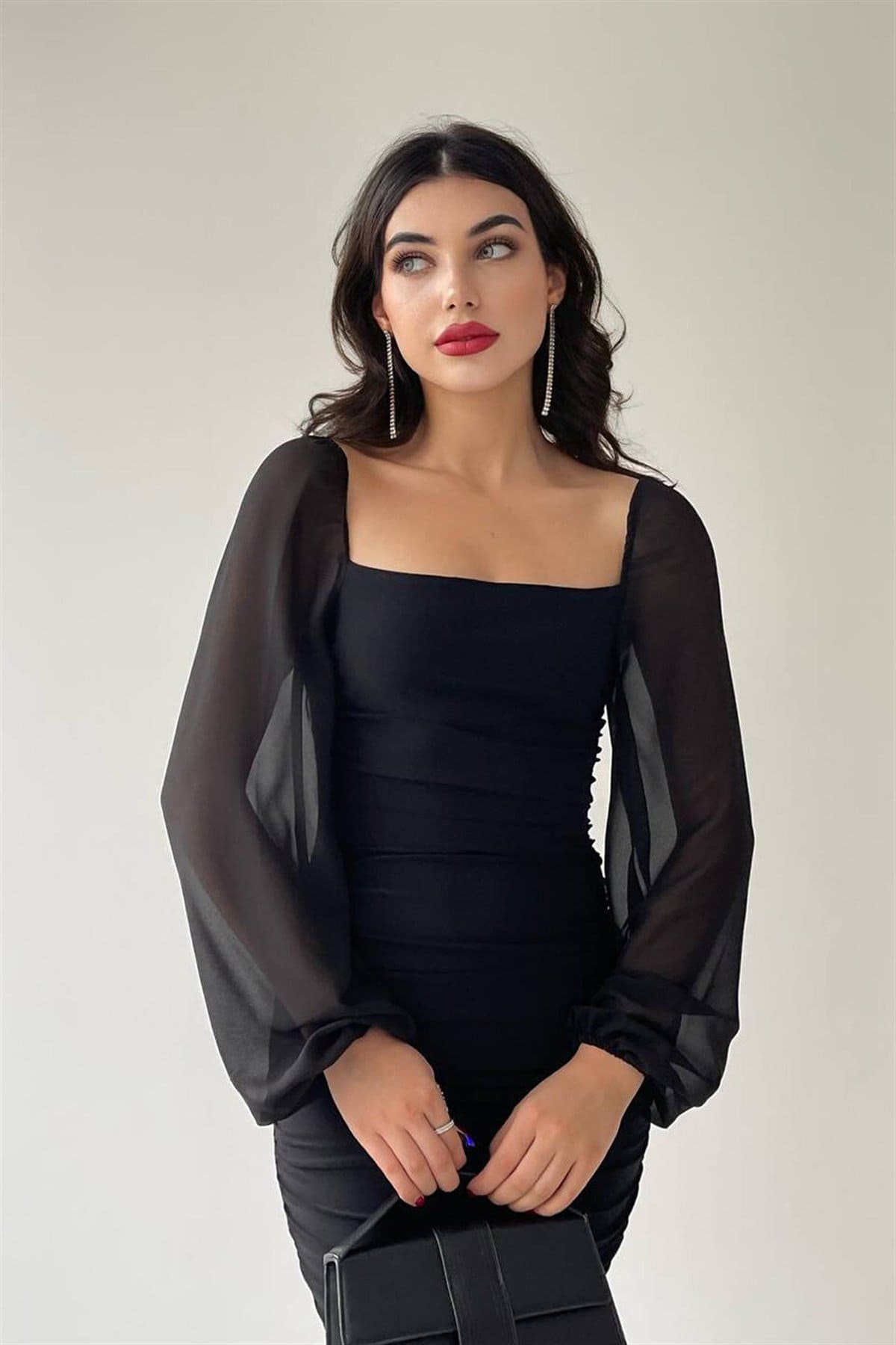 فستان كتفين بأكمام طويلة شفافة اسود - الصورة 3