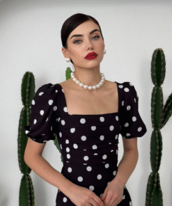 فستان أسود بنقاط بولكا بيضاء