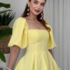 فستان ملكي أصفر بقصة كلوش وأكمام منفوشة💛