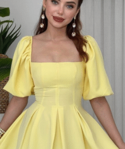 فستان ملكي أصفر بقصة كلوش وأكمام منفوشة💛