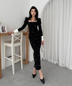 فستان أسود ستيل بإكسسوار اللؤلؤ